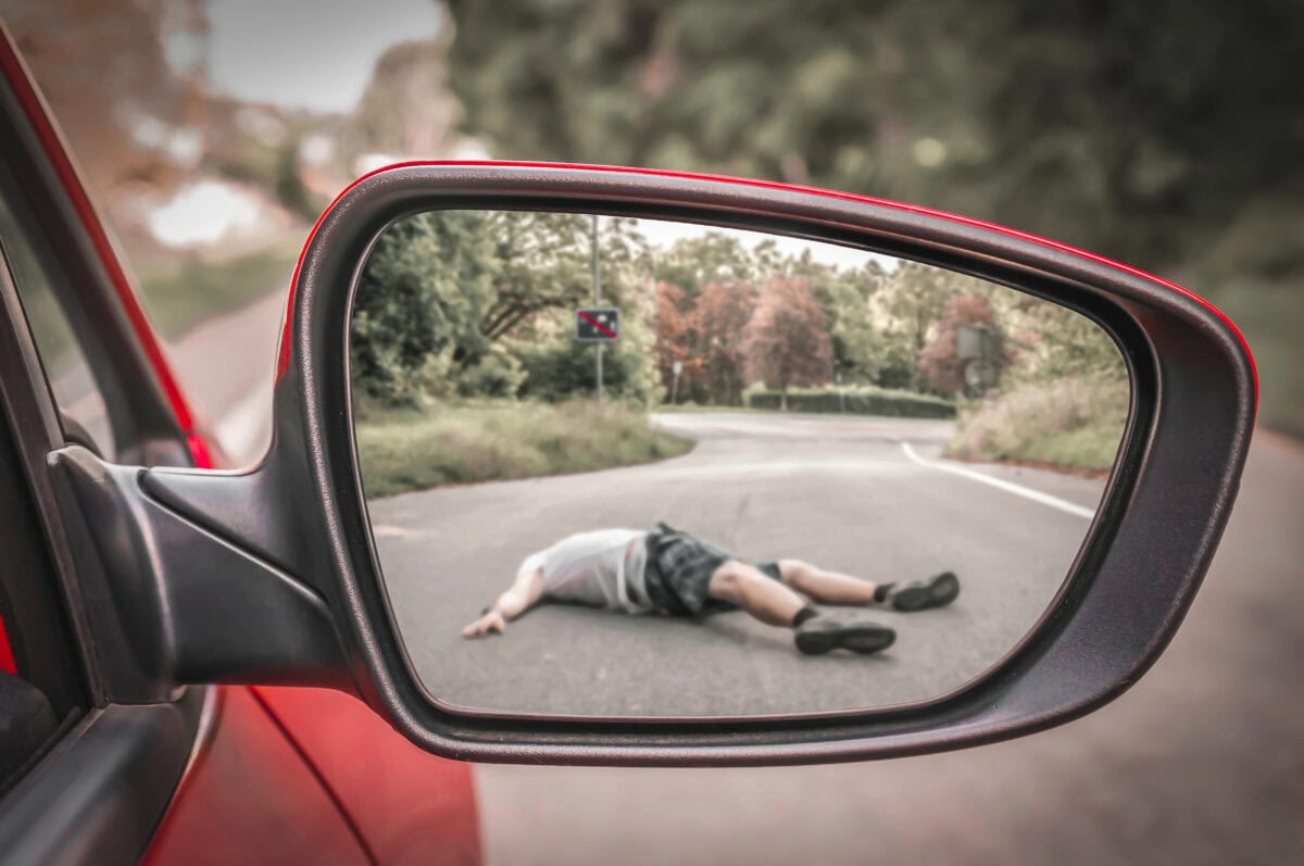 Rearview mirror with a man hit by a car